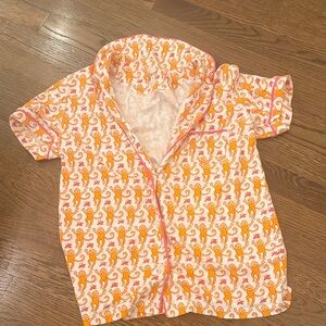 Roller Rabbit orange pajama set, size small, good condition.